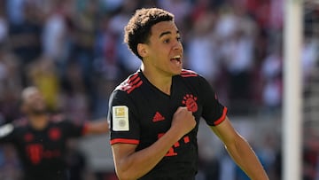 Bayern Munich's German midfielder Jamal Musiala celebrates scoring during the German first division Bundesliga football match between FC Cologne and FC Bayern Munich in Cologne, western Germany on May 27, 2023. (Photo by CHRISTOF STACHE / AFP) / DFL REGULATIONS PROHIBIT ANY USE OF PHOTOGRAPHS AS IMAGE SEQUENCES AND/OR QUASI-VIDEO