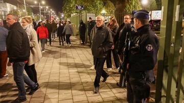 Police officers stand guard as people leave King Baudouin Stadium after the match between Belgium and Sweden was suspended following a shooting in Brussels, Belgium, October 16, 2023 REUTERS/Yves Herman