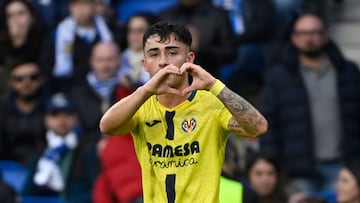 Villarreal's Spanish forward #20 Alberto Moleiro celebrates scoring his team's third goal during the Spanish league football match between Real Sociedad and Villarreal CF at Anoeta Stadium in San Sebastian on November 30, 2025. (Photo by ANDER GILLENEA / AFP)