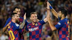 Barcelona&#039;s Brazilian midfielder Arthur (C) is congratulated by teammates Barcelona&#039;s Argentine forward Lionel Messi (L) and Barcelona&#039;s Uruguayan forward Luis Suarez (R) after scoring the second goal during the Spanish league football matc