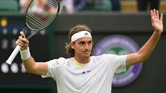 Greece's Stefanos Tsitsipas celebrates beating Australia's Jordan Thompson during their men's singles tennis match on the fourth day of the 2022 Wimbledon Championships at The All England Tennis Club in Wimbledon, southwest London, on June 30, 2022. (Photo by SEBASTIEN BOZON / AFP) / RESTRICTED TO EDITORIAL USE