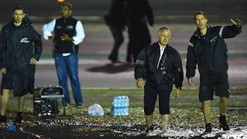 Doha (Qatar), 25/03/2017.- Track officials inspect the track during the qualifying session for the Motorcycling Grand Prix of Qatar at Al Losail International Circuit in Doha, Qatar, 25 March 2017. The qualifying was cancelled due to heavy rain. The 2017 MotoGP World Championship season's first race will be held in Doha on 26 March. (Ciclismo, Motociclismo) EFE/EPA/NOUSHAD THEKKAYIL