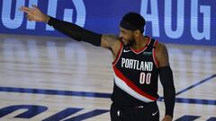 Aug 15, 2020; Lake Buena Vista, Florida, USA; Carmelo Anthony #00 of the Portland Trail Blazers celebrates a three point shot against the Memphis Grizzlies during the fourth quarter in the Western Conference play-in game one at The Field House. Mandatory Credit: Kevin C. Cox/Pool Photo-USA TODAY Sports