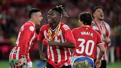 Athletic Bilbao's Spanish forward #11 Nico Williams celebrates victory with teammates at the end of the Spanish Copa del Rey (King's Cup) final football match between Athletic Club Bilbao and RCD Mallorca at La Cartuja stadium in Seville on April 6, 2024. (Photo by CRISTINA QUICLER / AFP)