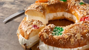 Epiphany cake "Roscon de Reyes" on wooden table
