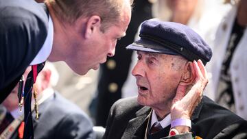 Britain's Prince William, the Prince of Wales speaks with a D-Day veteran as King Charles III and Queen Camilla lead the commemorative events in Portsmouth ahead of the actual 80th Anniversary of D-Day on June 6th in Portsmouth, Britain, June 05, 2024. Leon Neal/Pool via REUTERS