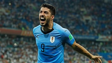 (FILES) Uruguay's forward Luis Suarez celebrates his teams win during the Russia 2018 World Cup round of 16 football match between Uruguay and Portugal at the Fisht Stadium in Sochi on June 30, 2018. The coach of the Uruguayan football team, Marcelo Bielsa, notified the reserve of the Celeste's historic scorer Luis Suarez for the next two games of the South American Qualifiers for the 2026 World Cup, the media reported on Tuesday October 31, 2023. The Argentine coach could thus summon Suarez for the double FIFA date in November, in which Uruguay will face Argentina on Thursday the 16th in Buenos Aires, and Bolivia, on Tuesday the 21st in Montevideo. (Photo by Odd ANDERSEN / AFP) / RESTRICTED TO EDITORIAL USE - NO MOBILE PUSH ALERTS/DOWNLOADS