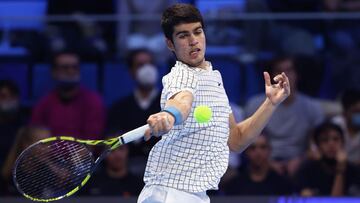 MILAN, ITALY - NOVEMBER 12: Carlos Alcaraz of Spain in action against Sebastian Baez of Argentina in the semi finals during Day Four of the Next Gen ATP Finals at Palalido Stadium on November 12, 2021 in Milan, Italy. (Photo by Julian Finney/Getty Images)