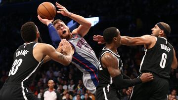 Oct 31, 2018; Brooklyn, NY, USA; Detroit Pistons forward Blake Griffin (23) passes the ball against Brooklyn Nets guard Allen Crabbe (33) and forward Rondae Hollis-Jefferson (24) and forward Jared Dudley (6) in the second quarter at Barclays Center. Mandatory Credit: Nicole Sweet-USA TODAY Sports