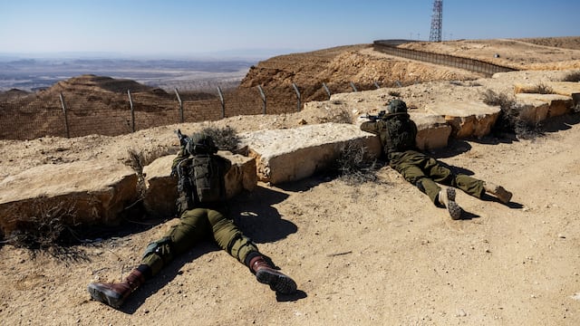 Female Israeli combat soldiers from the Bardelas Battalion look out over Israel's border with Egypt in southern Israel on February 21, 2024, amid the ongoing conflict in Gaza between Israel and the Palestinian Islamist group Hamas. Israel is one of the few countries in the world where military service is compulsory for women from the age of 18, and female soldiers serving in combat units or in support roles away from the front line have featured prominently at different stages of the current war in Gaza. Women serve as military pilots, in naval units and in the infantry, training with male counterparts and serving under the same conditions. REUTERS/Ronen Zvulun
