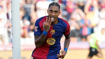 Barcelona's Raphinha celebrates scoring his side's 5th goal during the Spanish La Liga soccer match between FC Barcelona and Valladolid at the Olympic stadium in Barcelona, Spain, Saturday, Aug. 31, 2024. (AP Photo/Joan Monfort)