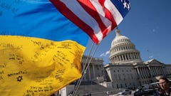 Flags flutter as pro-Ukrainian supporters demonstrate outside the U.S. Capitol after the U.S. House of Representatives voted on legislation providing $95 billion in security assistance to Ukraine, Israel and Taiwan, at Capitol Hill in Washington, U.S., April 20, 2024. REUTERS/Ken Cedeno