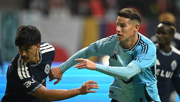 Mar 15, 2026; Vancouver, British Columbia, CAN; Vancouver Whitecaps FC defender Mathías Laborda (2) defends against Minnesota United fC midfielder James Rodriguez (10) during the second half during the second half at BC Place. Mandatory Credit: Anne-Marie Sorvin-Imagn Images