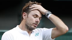 Switzerland&#039;s Stan Wawrinka reacts against Russia&#039;s Daniil Medvedev during their men&#039;s singles first round match on the first day of the 2017 Wimbledon Championships at The All England Lawn Tennis Club in Wimbledon