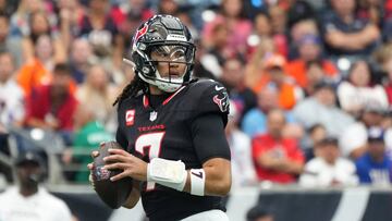 Nov 2, 2025; Houston, Texas, USA; Houston Texans quarterback C.J. Stroud (7) drops to throw during the first half against the Denver Broncos at NRG Stadium. Mandatory Credit: Sean Thomas-Imagn Images