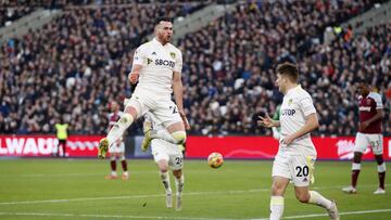 Soccer Football - Premier League - West Ham United v Leeds United - London Stadium, London, Britain - January 16, 2022 Leeds United's Jack Harrison celebrates scoring their third goal and his hat-trick with Daniel James Action Images via Reuters/Pete