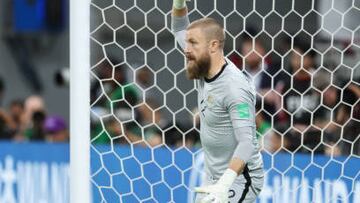 DOHA, QATAR - JUNE 13: Goalkeeper Andrew Redmayne of Australia waves his arms around in a bid to put off his opponent in the penalty shoot out during the 2022 FIFA World Cup Playoff match between Australia Socceroos and Peru at Ahmad Bin Ali Stadium on June 13, 2022 in Al Rayyan, Doha, Qatar. (Photo by Matthew Ashton - AMA/Getty Images)