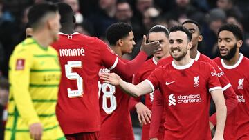 Liverpool's Portuguese striker #20 Diogo Jota (2R) celebrates scoring the team's third goal during the English FA Cup fourth round football match between Liverpool and Norwich City at Anfield in Liverpool, north west England on January 28, 2024. (Photo by Paul ELLIS / AFP) / RESTRICTED TO EDITORIAL USE. No use with unauthorized audio, video, data, fixture lists, club/league logos or 'live' services. Online in-match use limited to 120 images. An additional 40 images may be used in extra time. No video emulation. Social media in-match use limited to 120 images. An additional 40 images may be used in extra time. No use in betting publications, games or single club/league/player publications. / 