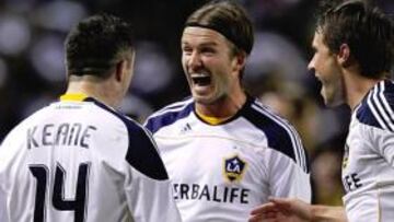 Beckham celebra con Robbie Keane uno de los goles con los que los Galaxy derrotaron al Salt Lake en la final del Oeste.