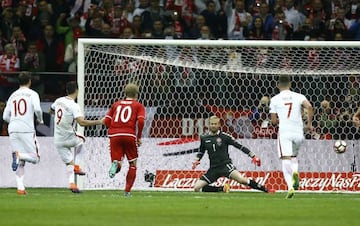 Robert Lewandowski wrong-foots Kaspar Schmeichel in the Denmark goal to tuck home his second goal