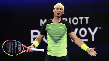 Spain's Rafael Nadal reacts on a point against Australia's Alex De Minaur during their men's singles match on day five of the United Cup tennis tournament in Sydney on January 2, 2023. (Photo by DAVID GRAY / AFP) / -- IMAGE RESTRICTED TO EDITORIAL USE - STRICTLY NO COMMERCIAL USE --