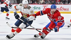 MONTREAL, QC - APRIL 29: Maxim Mamin #98 of the Florida Panthers skates the puck against Jeff Petry #26 of the Montreal Canadiens during the first period at Centre Bell on April 29, 2022 in Montreal, Canada.   Minas Panagiotakis/Getty Images/AFP
== FOR NEWSPAPERS, INTERNET, TELCOS & TELEVISION USE ONLY ==