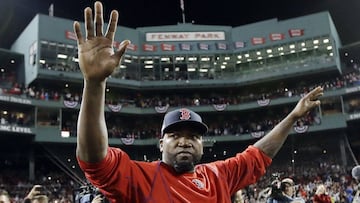 Boston Red Sox David Ortiz waves from the field at Fenway Park.