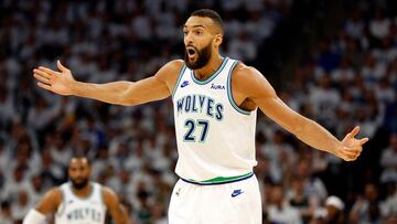 MINNEAPOLIS, MINNESOTA - APRIL 23: Rudy Gobert #27 of the Minnesota Timberwolves reacts during action against the Phoenix Suns in the second quarter of game two of the Western Conference First Round Playoffs at Target Center on April 23, 2024 in Minneapolis, Minnesota. NOTE TO USER: User expressly acknowledges and agrees that, by downloading and or using this photograph, User is consenting to the terms and conditions of the Getty Images License Agreement. David Berding/Getty Images/AFP (Photo by David Berding / GETTY IMAGES NORTH AMERICA / Getty Images via AFP)