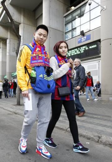 Seguidores del Real Madrid y Barcelona.