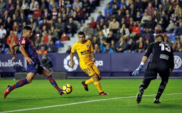 Róber turns a low cross into his own net to put Atlético 1-0 ahead at the Ciutat de Valencia.