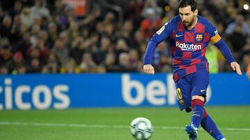 (FILES) In this file photo taken on March 07, 2020, Barcelona's Argentine forward Lionel Messi scores a penalty during the Spanish league football match between FC Barcelona and Real Sociedad at the Camp Nou stadium in Barcelona, Spain. - Lionel Mess