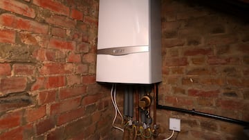 A gas-powered boiler is seen in and attic in Hertfordshire, Britain, September 20, 2023. REUTERS/Suzanne Plunkett