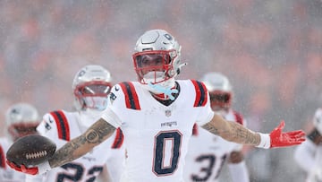 DENVER, COLORADO - JANUARY 25: Christian Gonzalez #0 of the New England Patriots celebrates after intercepting a pass from Jarrett Stidham #8 of the Denver Broncos (not pictured) intended for Marvin Mims Jr. #19 (not pictured) during the fourth quarter in the AFC Championship Playoff game at Empower Field At Mile High on January 25, 2026 in Denver, Colorado. Matthew Stockman/Getty Images/AFP (Photo by MATTHEW STOCKMAN / GETTY IMAGES NORTH AMERICA / Getty Images via AFP)