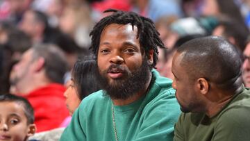 PHILADELPHIA,PA - MARCH 19 : Michael Bennett of the Philadelphia Eagles watches the 76ers against the Charlotte Hornets at Wells Fargo Center on March 19, 2018 in Philadelphia, Pennsylvania NOTE TO USER: User expressly acknowledges and agrees that, by downloading and/or using this Photograph, user is consenting to the terms and conditions of the Getty Images License Agreement. Mandatory Copyright Notice: Copyright 2018 NBAE (Photo by Jesse D. Garrabrant/NBAE via Getty Images)