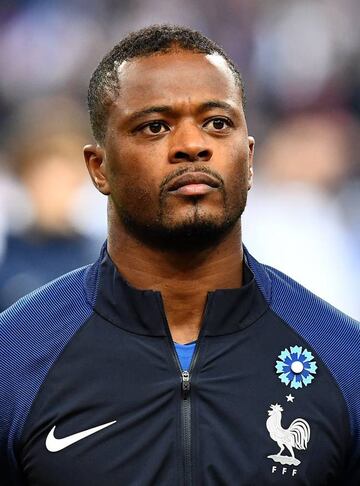 France's defender Patrice Evra standing prior to the 2018 World Cup group A qualifying football match between France and Sweden.