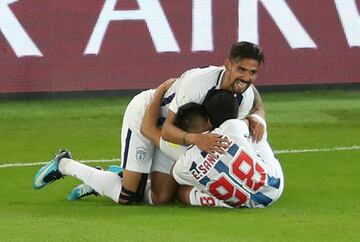 Soccer Football - FIFA Club World Cup - CF Pachuca vs Wydad AC - Zayed Sports City Stadium, Abu Dhabi, United Arab Emirates - December 9, 2017 Pachuca's Victor Guzman celebrates scoring their first goal with teammates REUTERS/Ahmed Jadallah