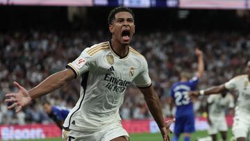 Real Madrid's English midfielder #5 Jude Bellingham celebrates after scoring his team's second goal during the Spanish Liga football match between Real Madrid CF and Getafe CF at the Santiago Bernabeu stadium in Madrid on September 2, 2023. (Photo by Thomas COEX / AFP)