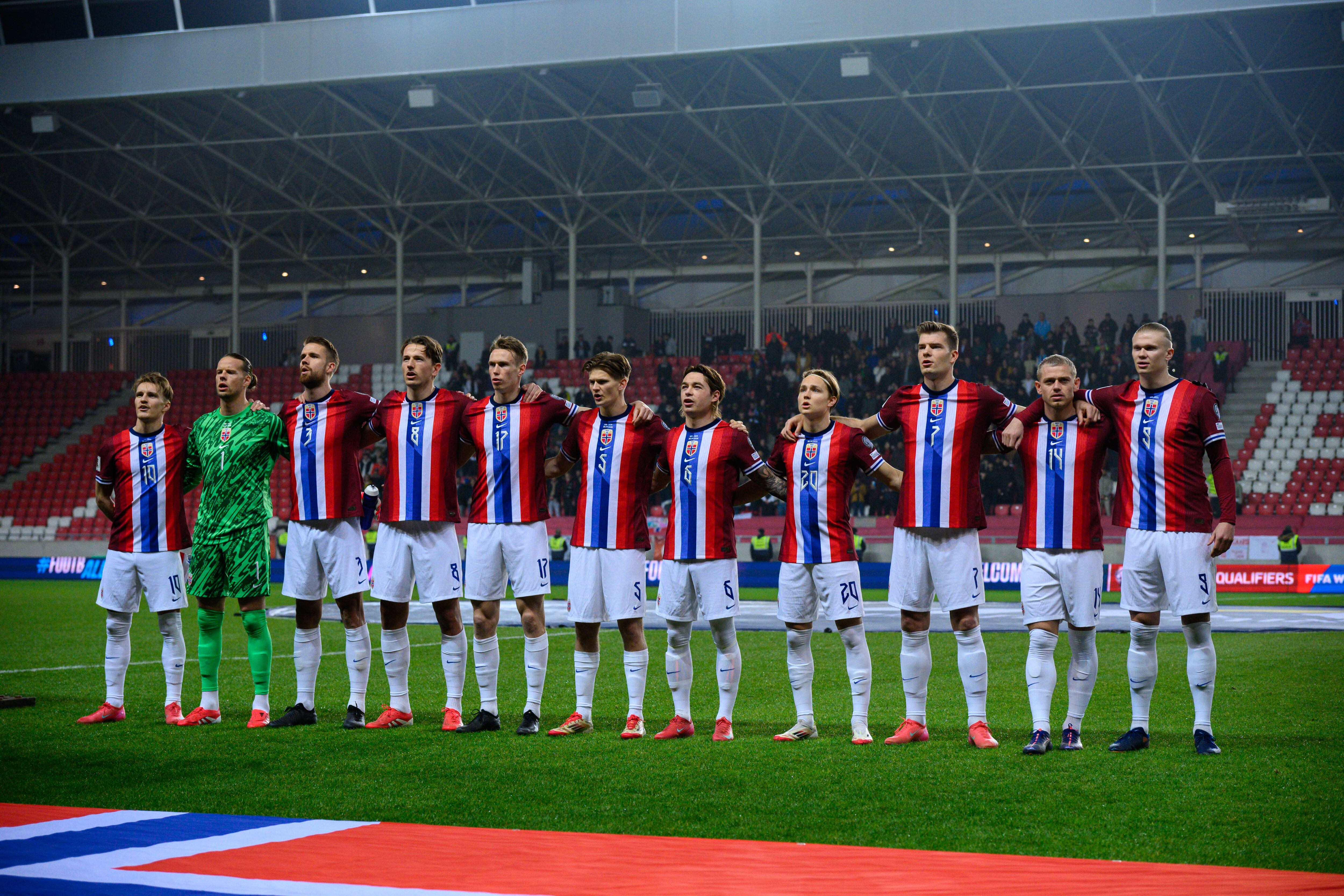 DEBRECEN, HUNGARY - MARCH 25: team of Norway line up for the national anthem (L-R) Martin Odegaard, Orjan Nyland, Kristoffer Ajer, Sander Berge, Torbjorn Heggem, David Moller Wolfe, Patrick Berg, Andreas Schjelderup, Alexander Sorloth, Julian Ryerson, Erling Haaland during the FIFA World Cup 2026 European Qualifier between Israel and Norway at Nagyerdei Stadion on March 25, 2025 in Debrecen, Hungary. (Photo by Sebastian Frej/MB Media/Getty Images)