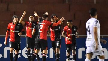 Melgar's Argentine forward Cristian Bordacahar (2-L) celebrates after scoring during the Copa Libertadores group stage second leg football match between Peru's Melgar and Argentina's Patronato, at the UNSA Monumental stadium in Arequipa, Peru, on June 6, 2023. (Photo by Diego Ramos / AFP)