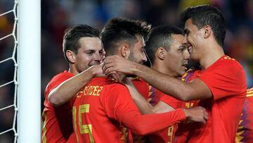 Spain&#039;s midfielder Brais Mendez (2L) celebrates a goal with teammates during the international friendly football match between Spain and Bosnia-Herzegovina at the Gran Canaria stadium in Las Palmas on November 18, 2018. (Photo by LLUIS GENE / AFP)