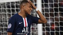 Paris Saint-Germain&#039;s French forward Kylian Mbappe reacts during the French L1 football match between Paris Saint-Germain (PSG) and Nimes Olympique on August 11, 2019 at the Parc des Princes stadium in Paris. (Photo by FRANCK FIFE / AFP)