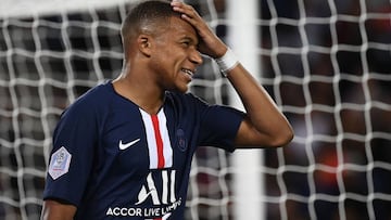 Paris Saint-Germain&#039;s French forward Kylian Mbappe reacts during the French L1 football match between Paris Saint-Germain (PSG) and Nimes Olympique on August 11, 2019 at the Parc des Princes stadium in Paris. (Photo by FRANCK FIFE / AFP)