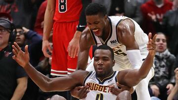 CHICAGO, IL - OCTOBER 31: Paul Millsap #4 and Malik Beasley #25 of the Denver Nuggets celebrate after Millsap hit the game winning shot as Zach LaVine #8 of the Chicago Bulls watches at the United Center on October 31, 2018 in Chicago, Illinois. The Nuggets defeated the Bulls 108-107 in overtime. NOTE TO USER: User expressly acknowledges and agrees that, by downloading and/or using this photograph, User is consenting to the terms and conditions of the Getty Images License Agreement. Jonathan Daniel/Getty Images/AFP
== FOR NEWSPAPERS, INTERNET, TELCOS & TELEVISION USE ONLY ==