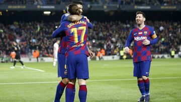 Barcelona&#039;s Antoine Griezmann, foreground, celebrates with Luis Suarez and Lionel Messi, right, after scoring the opening goal during a Spanish La Liga soccer match between Barcelona and Mallorca at Camp Nou stadium in Barcelona, Spain, Saturday, Dec