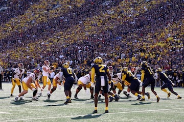 The USC Trojans run a first half play against the Michigan Wolverines at Michigan Stadium on September 21, 2024 in Ann Arbor