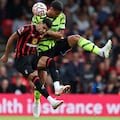 Bournemouth's English striker #09 Dominic Solanke (L) vies Arsenal's French defender #02 William Saliba during the English Premier League football match between Bournemouth and Arsenal at the Vitality Stadium in Bournemouth, southern England on September 30, 2023. (Photo by Adrian DENNIS / AFP) / RESTRICTED TO EDITORIAL USE. No use with unauthorized audio, video, data, fixture lists, club/league logos or 'live' services. Online in-match use limited to 120 images. An additional 40 images may be used in extra time. No video emulation. Social media in-match use limited to 120 images. An additional 40 images may be used in extra time. No use in betting publications, games or single club/league/player publications. /