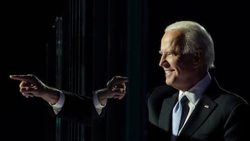 FILE PHOTO: President-elect Joe Biden points a finger at his election rally in Wilmington, Delaware, November 7. REUTERS/Kevin Lamarque/File Photo