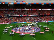 This general view shows performances during the opening ceremony ahead of the UEFA Women's Euro 2025 Group A football match between Switzerland and Norway at the St Jakob-Park Stadium in Basel on July 2, 2025. (Photo by Bernadett Szabo / POOL / AFP)