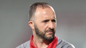 (FILES) In this file photo taken on May 09, 2017 Djamel Belmadi, head coach of Qatar's Lekhwiya, looks on during the AFC Champions League football match in Doha. / AFP PHOTO / Karim JAAFAR
