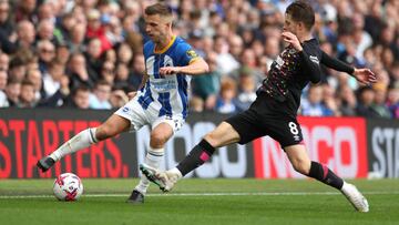 Brighton and Hove Albion's Joel Veltman (left) and Brentford's Mathias Jensen battle for the ball during the Premier League match at The AMEX Stadium, Brighton. Picture date: Saturday April 1, 2023. (Photo by Kieran Cleeves/PA Images via Getty Images)